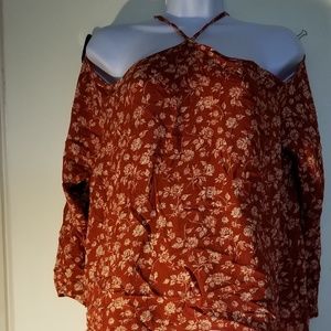 Rust colored cold shoulder top with flowers